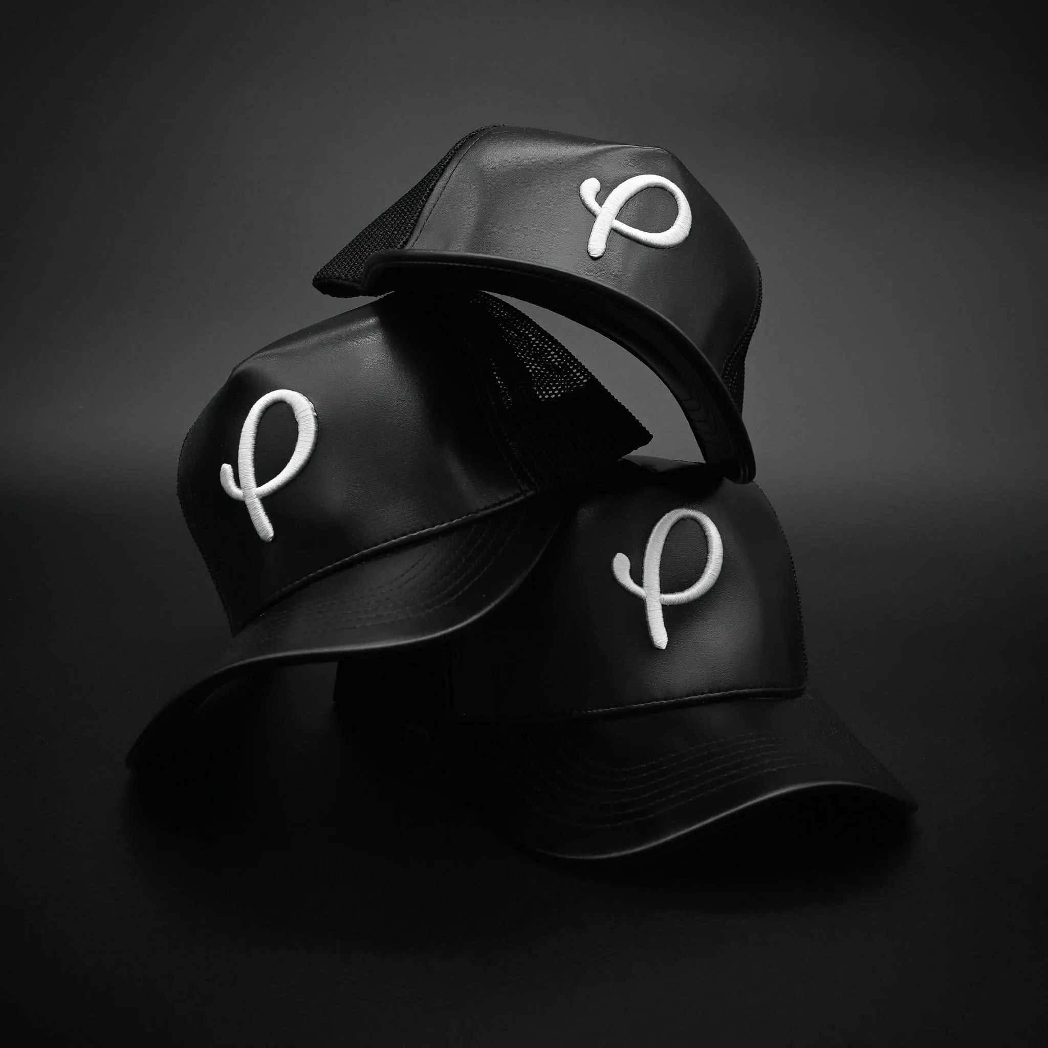 Black P Logo Leather Trucker Hat