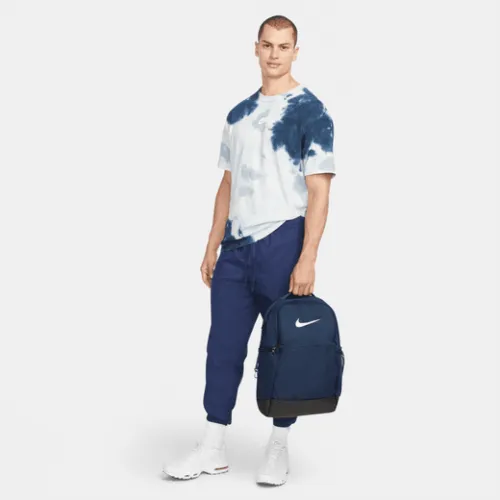 Nike Brasilia 9.5 Medium Backpack Navy  Grab your gear and get going with the Nike Brasilia Backpack. It has plenty of pockets t