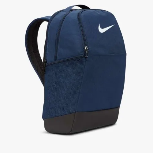 Nike Brasilia 9.5 Medium Backpack Navy  Grab your gear and get going with the Nike Brasilia Backpack. It has plenty of pockets t